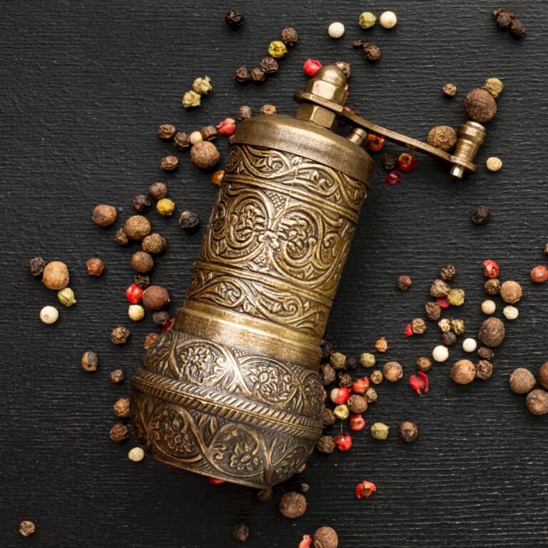 W. bartram nimrod repousse shell motif gun powder flask